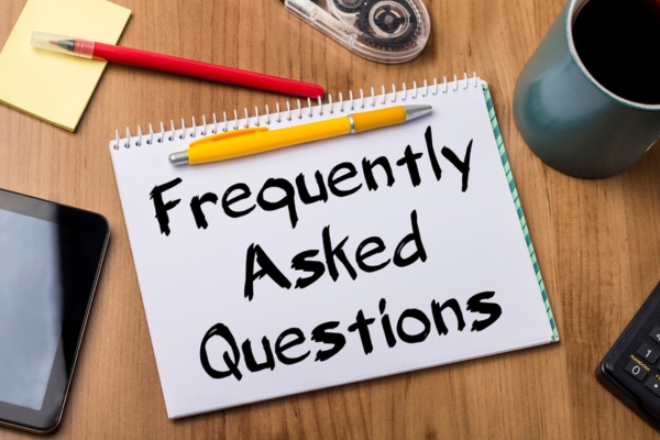 frequently asked questions written on a notebook depicting questions about fuel oil company