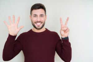 man holding 7 fingers up depicting 7 tips to prepare furnace