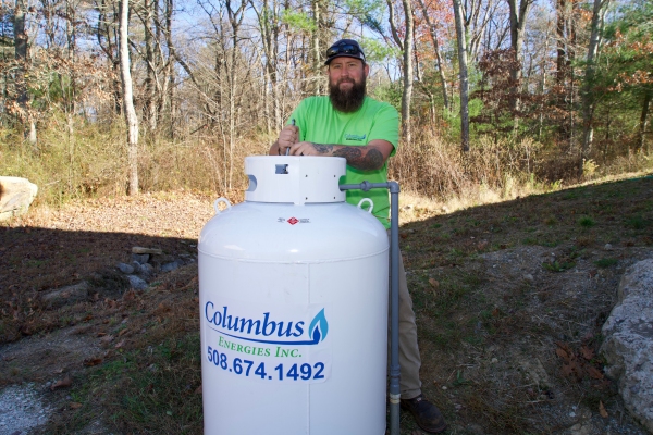 propane tank at home depicting fuel storage for home generator