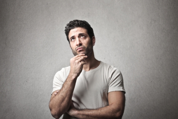 image of a man thinking depicting understanding the role of a smart oil gauge