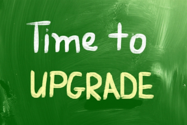 time to upgrade written on a chalkboard depicting air conditioning system