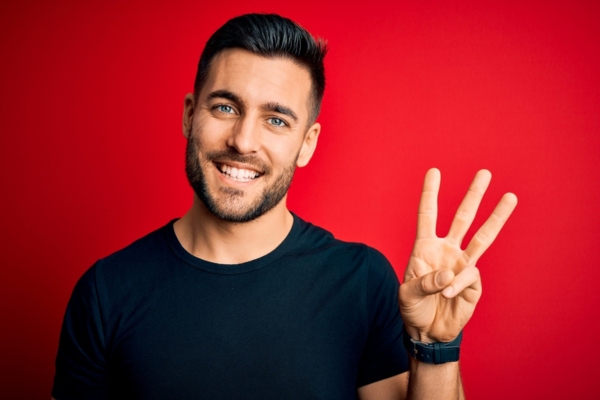 man holding 3 fingers up depicting Habits That Can Decrease Your AC Unit’s Lifespan