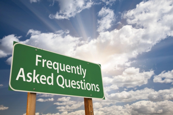 Frequently Asked Questions Green Road Sign depicting double-wall heating oil tank FAQs