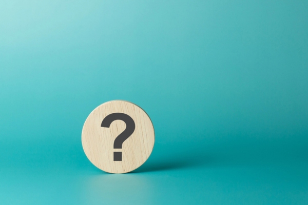 question mark on a wooden chip depicting FAQS about AFUE and AFUE2