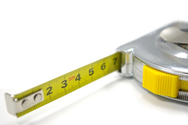 image of a tape measure depicting Main Elements That Influence Heating System Size