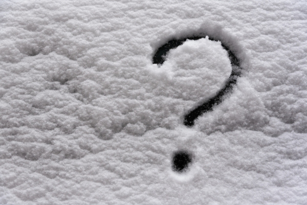 question mark doodled on snow depicting Common Questions About Furnace Repair Tips