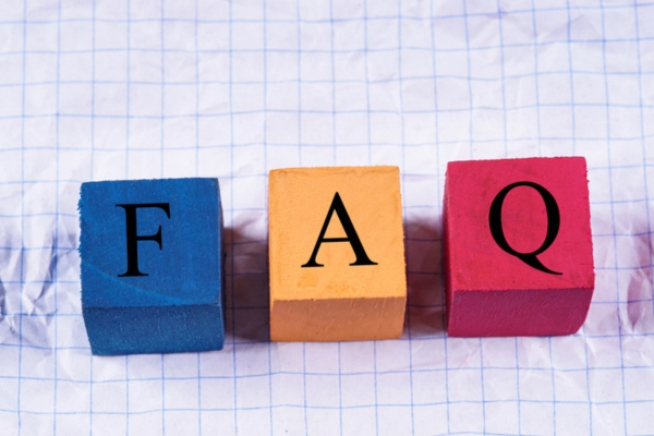 FAQ spelled using colorful wooden letter cubes depicting HVAC Service Myths questions