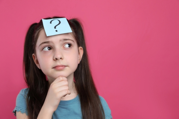 question mark on paper on a child's forehead depicting Propane Delivery Company FAQs