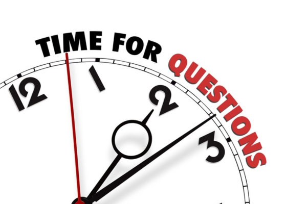 White clock with words Time for Questions on its face depicting Heating Oil in Summer FAQs