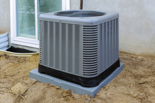 new air conditioner installed outside the house