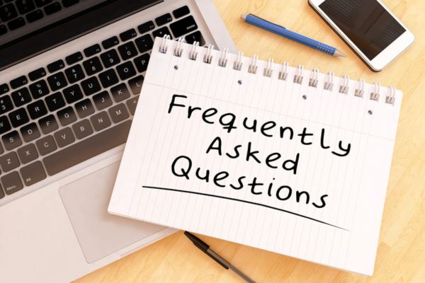 Frequently Asked Questions written on a notebook depicting Thermostat Problems